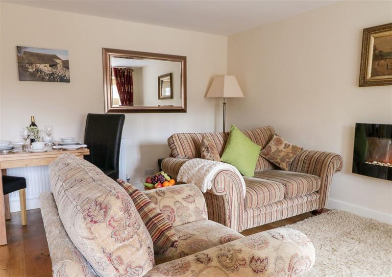 Relax in the living area at The Hayloft at Tennant Barn, Malham
