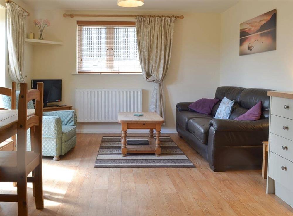 Open plan living space at The Hayloft in Binknoll, near Wooton Bassett, Wiltshire