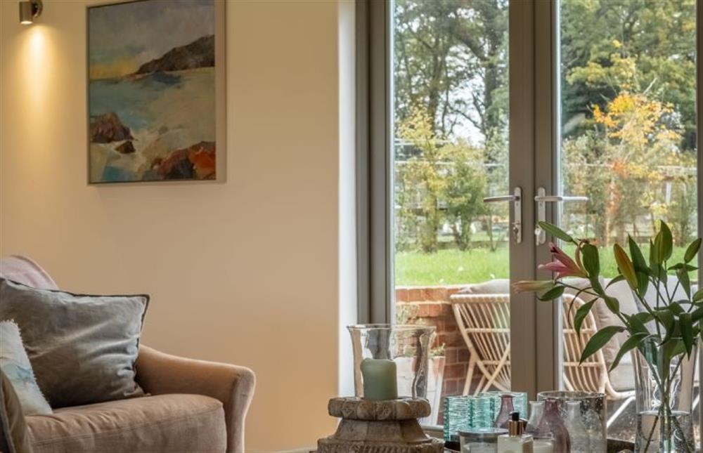 Admire the work of a local artist in the sitting room at The Hayloft, Felbrigg near Norwich