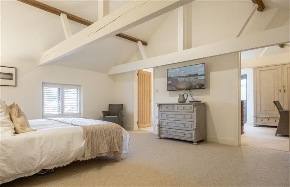 Master bedroom with Sky television at The Hayloft, Felbrigg near Norwich