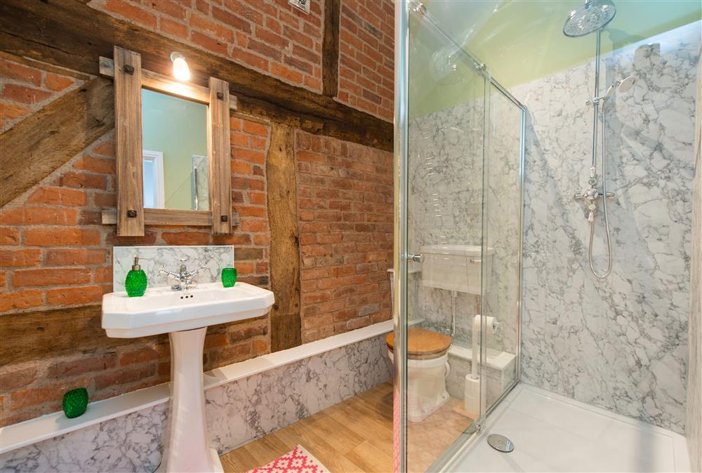 En-suite shower room with over-sized shower cubicle and rain shower head at The Hayloft, Monkland nr Leominster