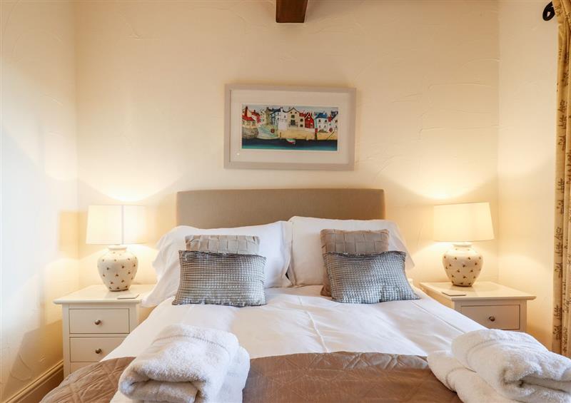 One of the 4 bedrooms at The Hayloft, Woolston near Malborough