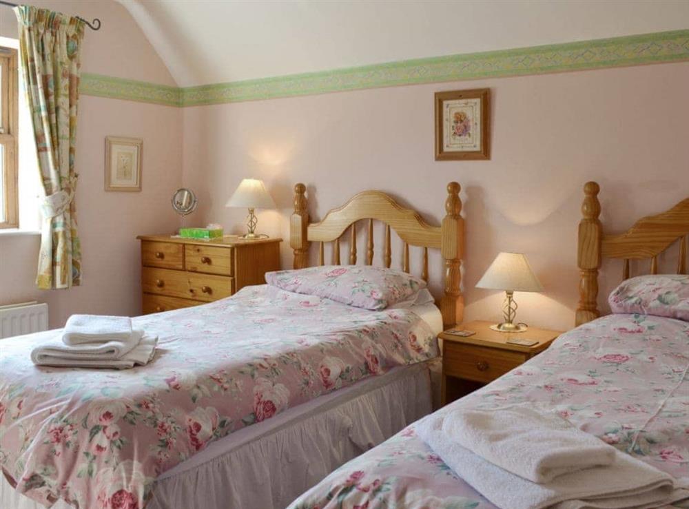 Light and airy twin bedroom at The Hayloft in York, North Yorkshire