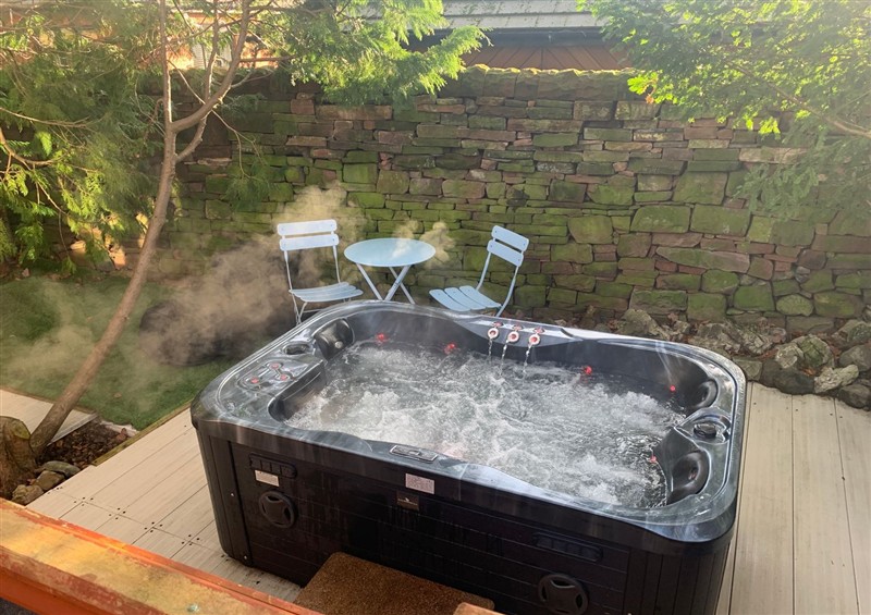 There is a hot tub (photo 2) at The Hermitage, Penrith