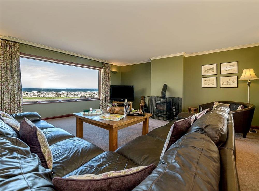 Living room with wonderful sea views at The Herons in South Keiss, near Wick, Caithness