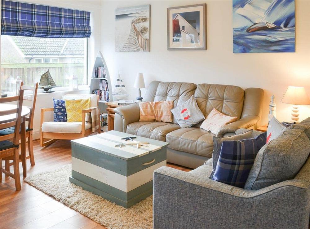Lounge area of open-plan living space at The Hideaway in Beadnell, Northumberland