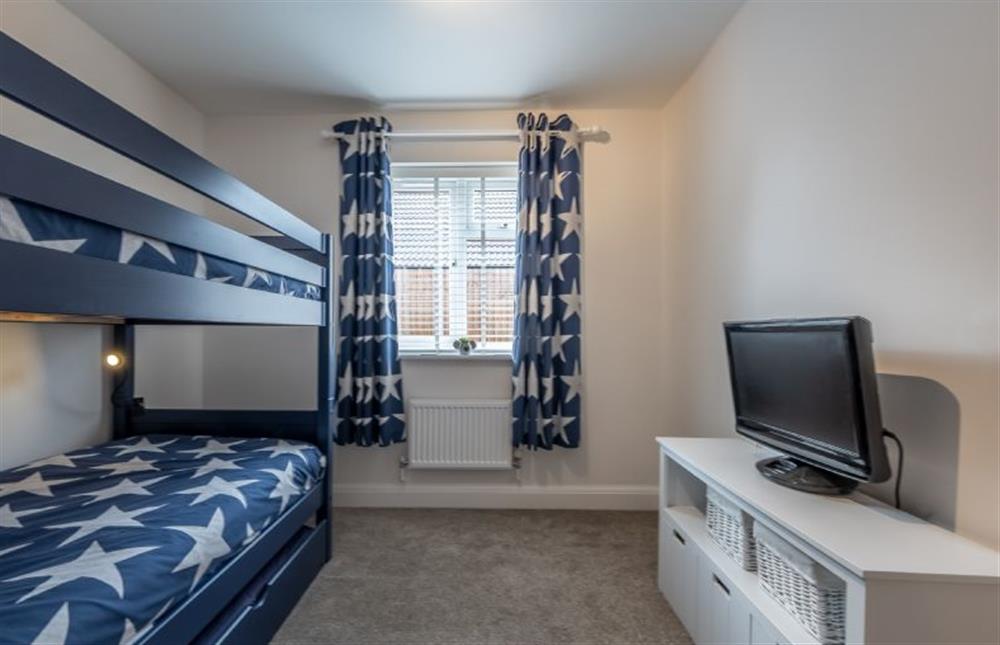 Ground floor: Bedroom three has bunk beds and a television at The Hideaway, Docking near Kings Lynn