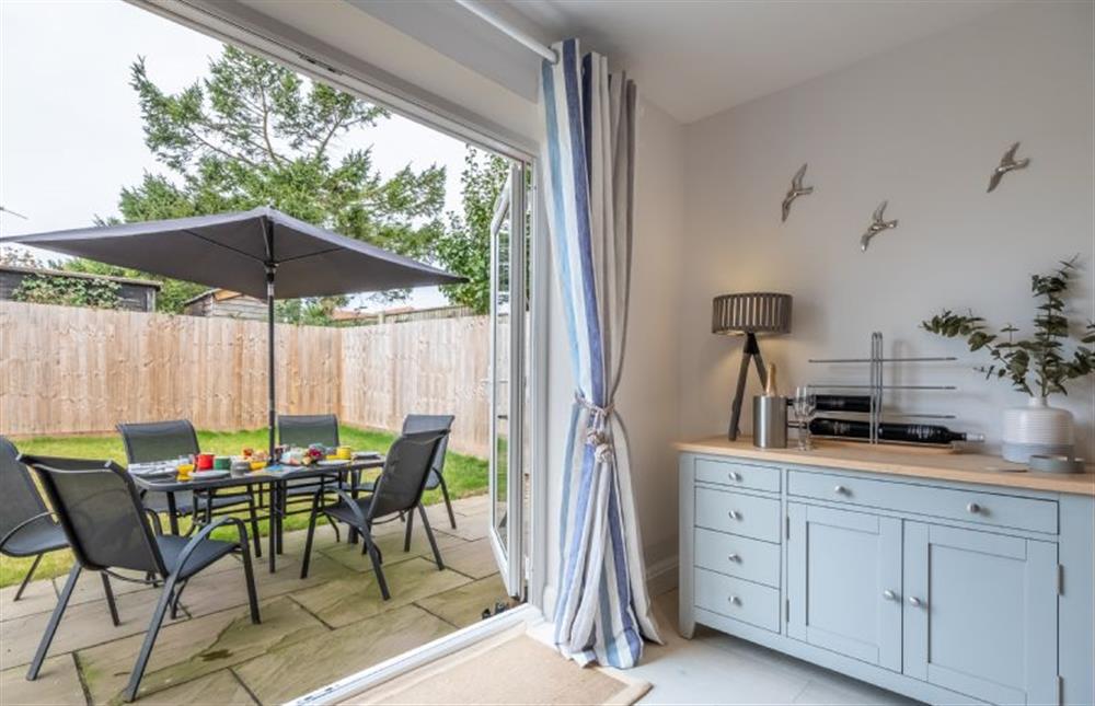 Ground floor: The sitting room has french doors leading to the garden at The Hideaway, Docking near Kings Lynn