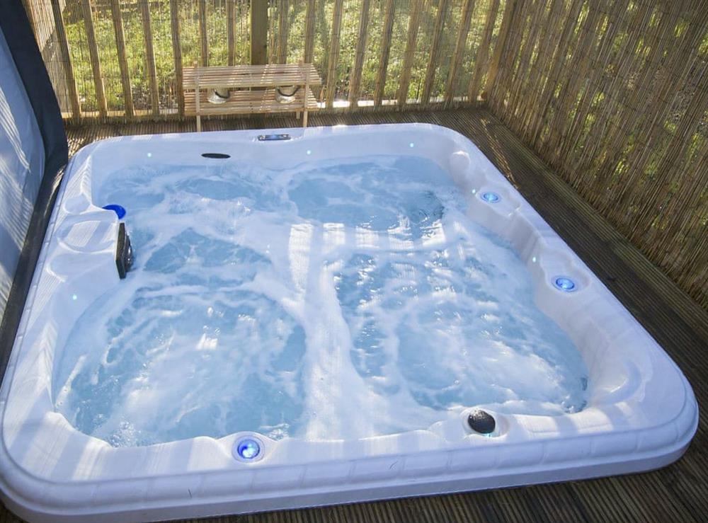 Relax in the private hot tub at The Hideaway in Otterburn, near Bellingham, Northumberland