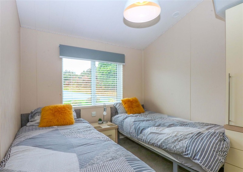 A bedroom in The Hideaway (photo 2) at The Hideaway, Pwllheli