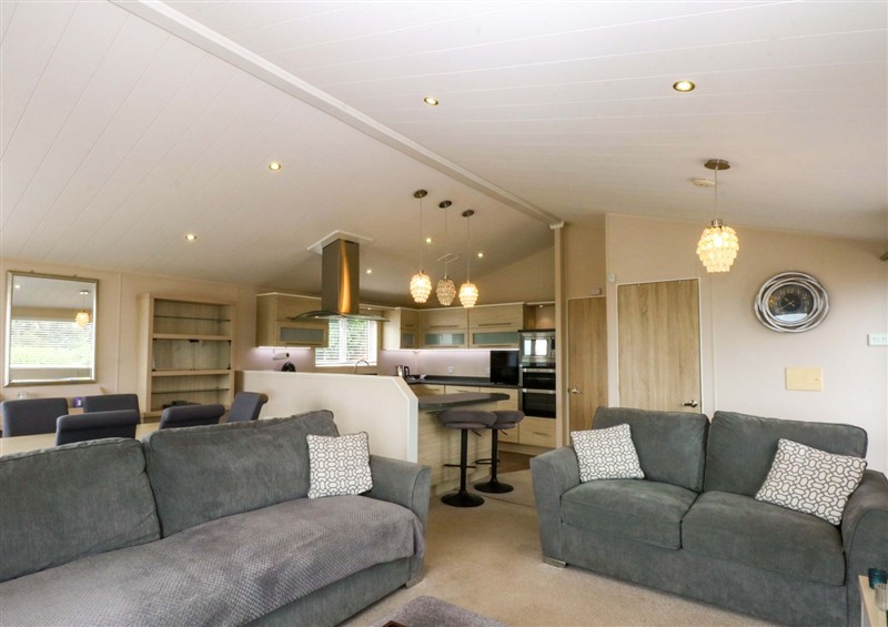 Relax in the living area (photo 2) at The Hideaway, Pwllheli