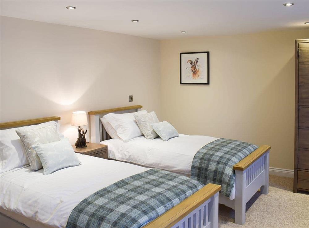 Well appointed pretty twin bedroom at The Hideaway in Sleights, near Whitby, North Yorkshire