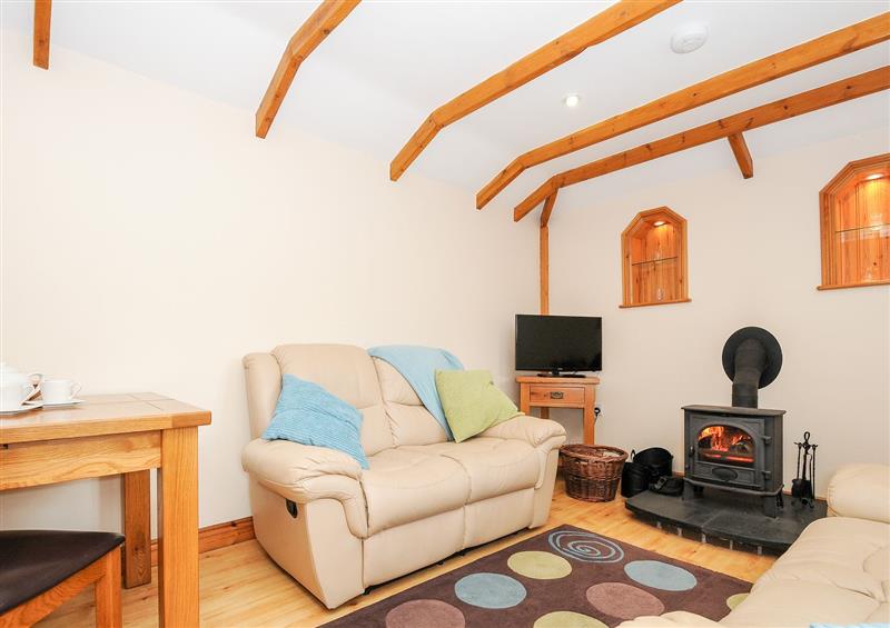 Relax in the living area at The Hideaway, St Austell