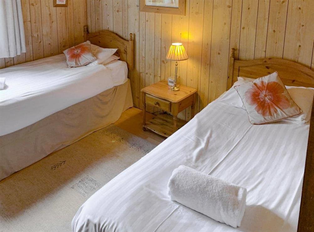 Good-sized twin bedroom at The Hive in Warmwell, near Dorchester, Dorset