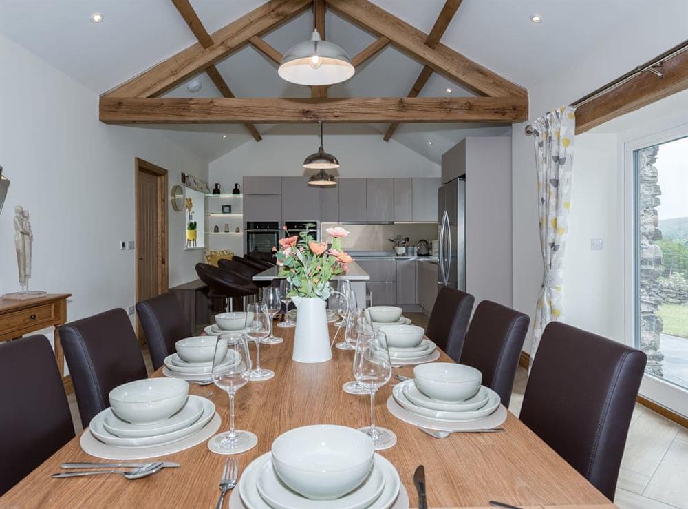 The Hoggest dining area with vaulted ceiling & wood beams at The Hoggest and Annexe in Threlkeld, near Keswick, Cumbria