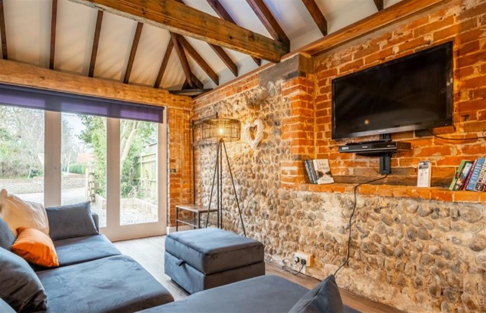 Ground floor: Sitting room area with Smart television at The Homestead and Black Cat Barn, Southrepps near Norwich
