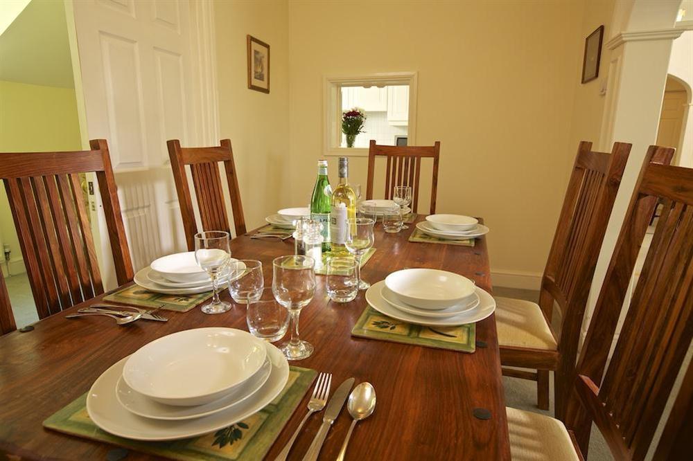 Alcoved dining area with large table and chairs (photo 2) at The Hoot in Sandhills Road, Salcombe