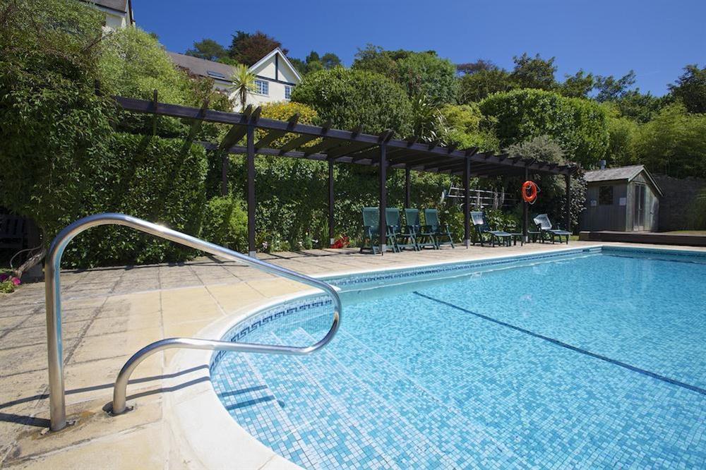 Enjoy use of a superb, private outdoor heated swimming pool at The Hoot in Sandhills Road, Salcombe