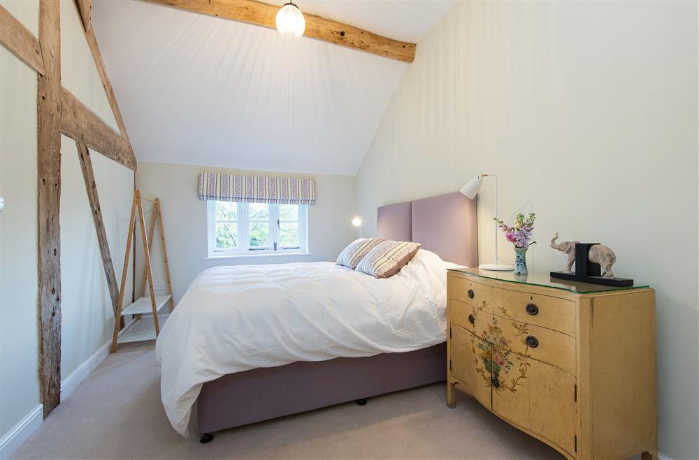 Bedroom two with 6’ zip and link bed and en-suite shower room at The Hop Kiln, Monkland nr Leominster