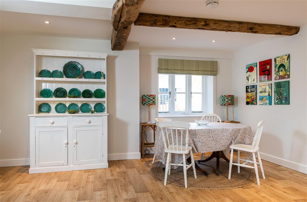 Open plan dining area with seating for four guests at The Hop Kiln, Monkland nr Leominster