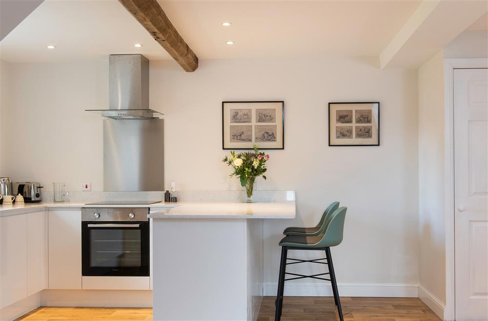 Open plan kitchen with breakfast bar and stools (photo 2) at The Hop Kiln, Monkland nr Leominster