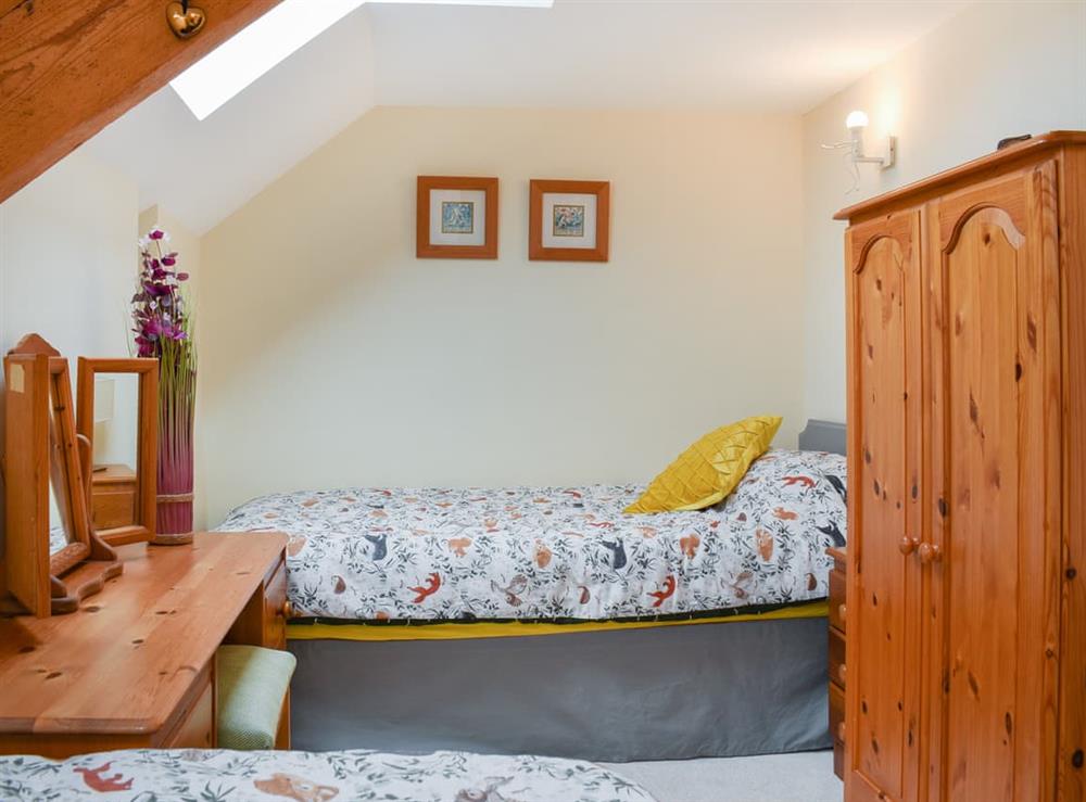 Twin bedroom at The Imaginary Barn in Hartland, Devon