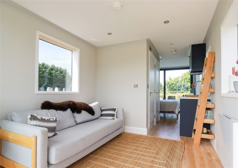 This is the living room at The Lake Boat exclusive retreat, Black Cross near St Columb Major