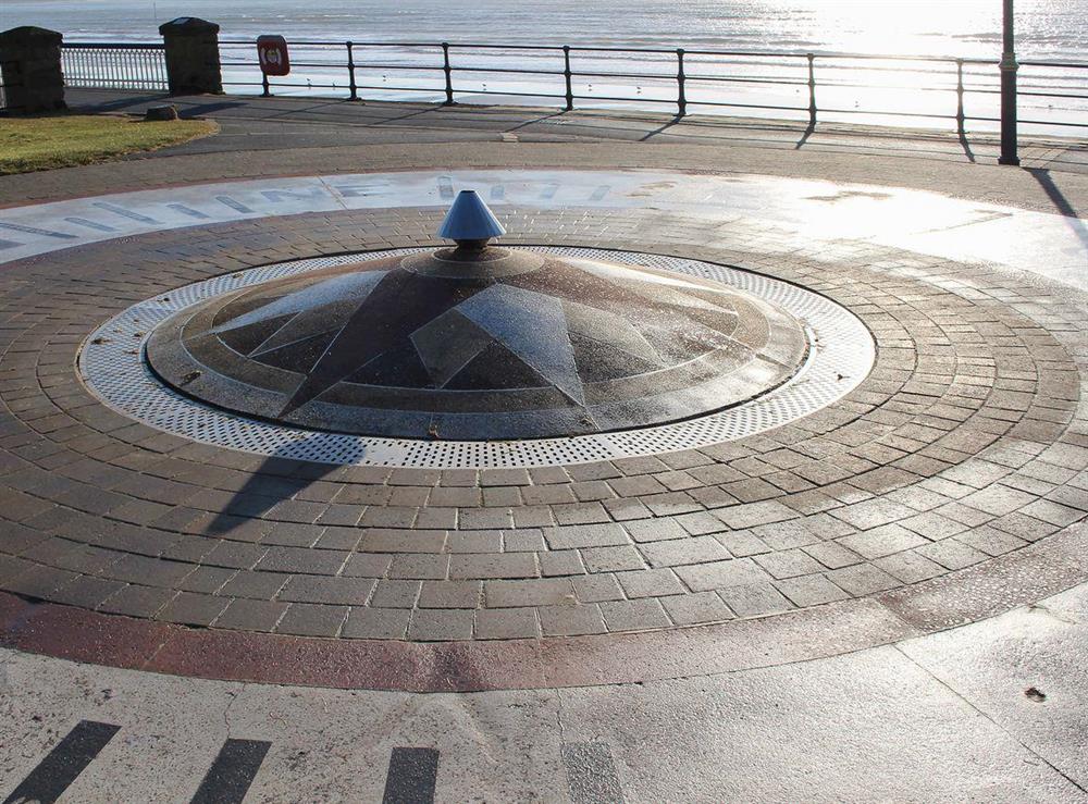Beautiful mosaic compass with fountain on the promenade