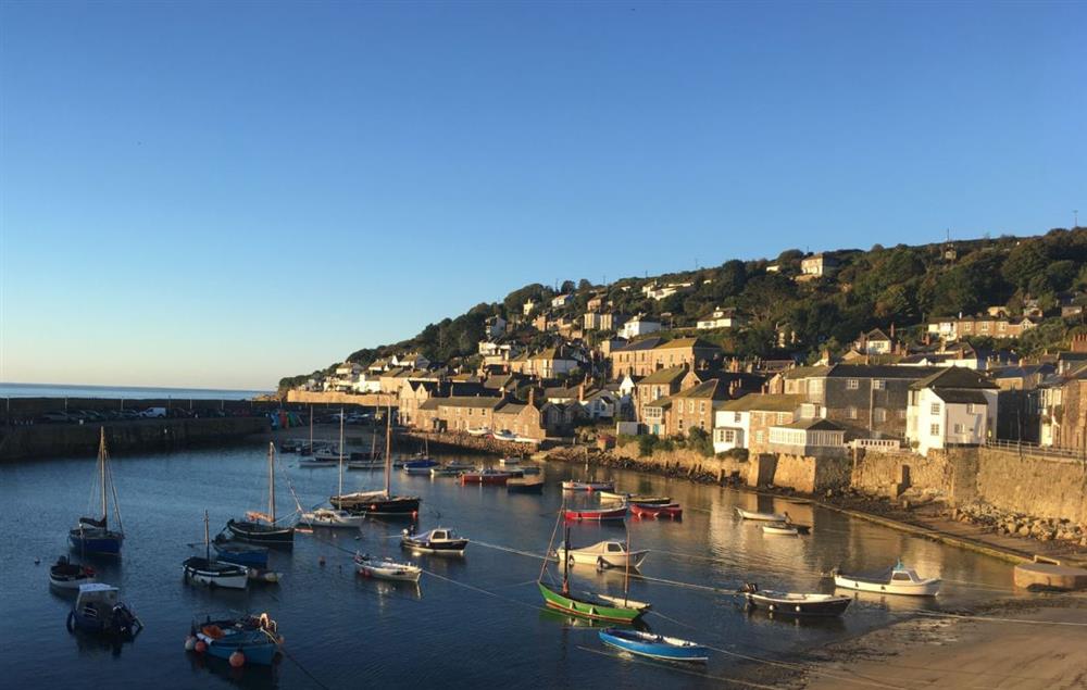 Beautiful scenic image of Mousehole Harbour at The Langley Tarne, Mousehole