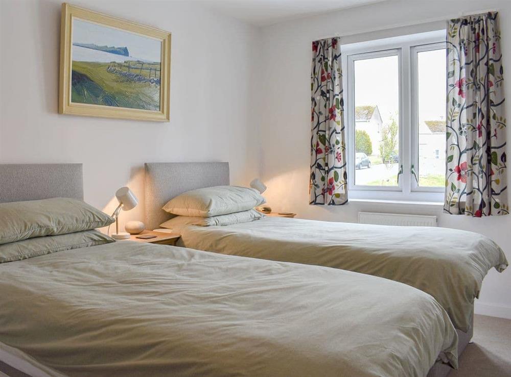 Comfortable twin bedroom at The Light House in Fowey, Cornwall