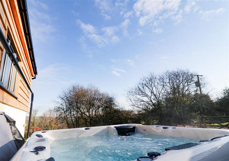 There is a hot tub at The Linhay, Cadeleigh near Tiverton