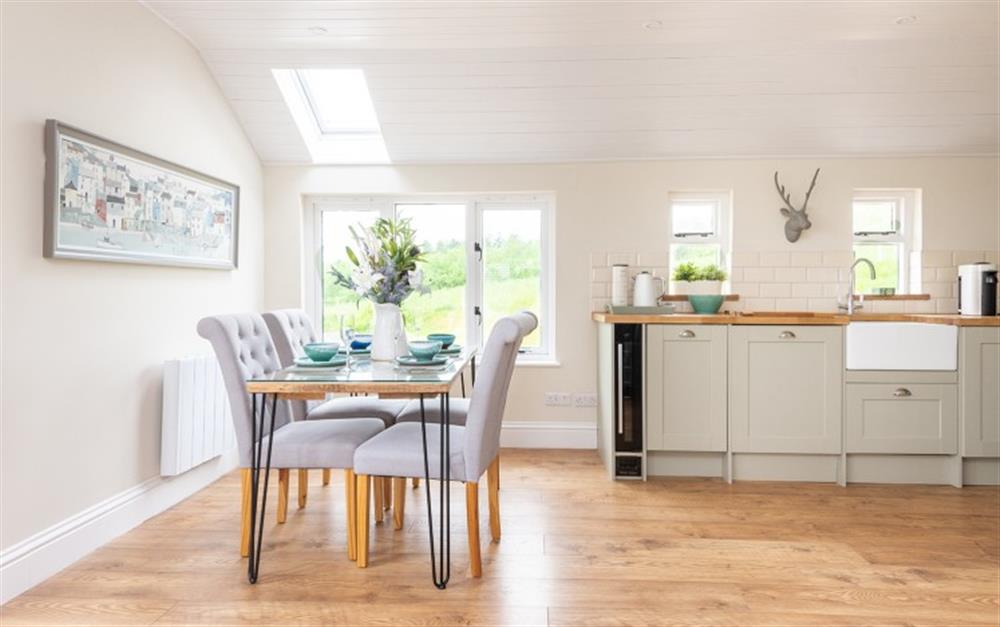 Dining room through to kitchen at The Linhay, Chipton Barton in Dittisham