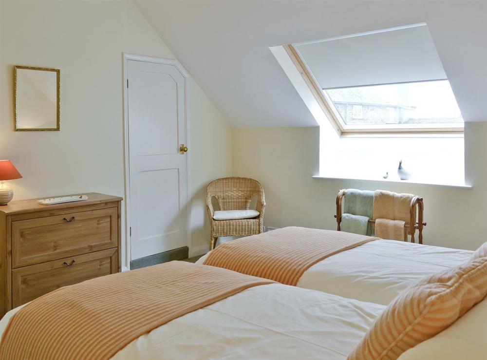Dressing area and storage in twin bedroom at The Linhay in Chulmleigh, Devon