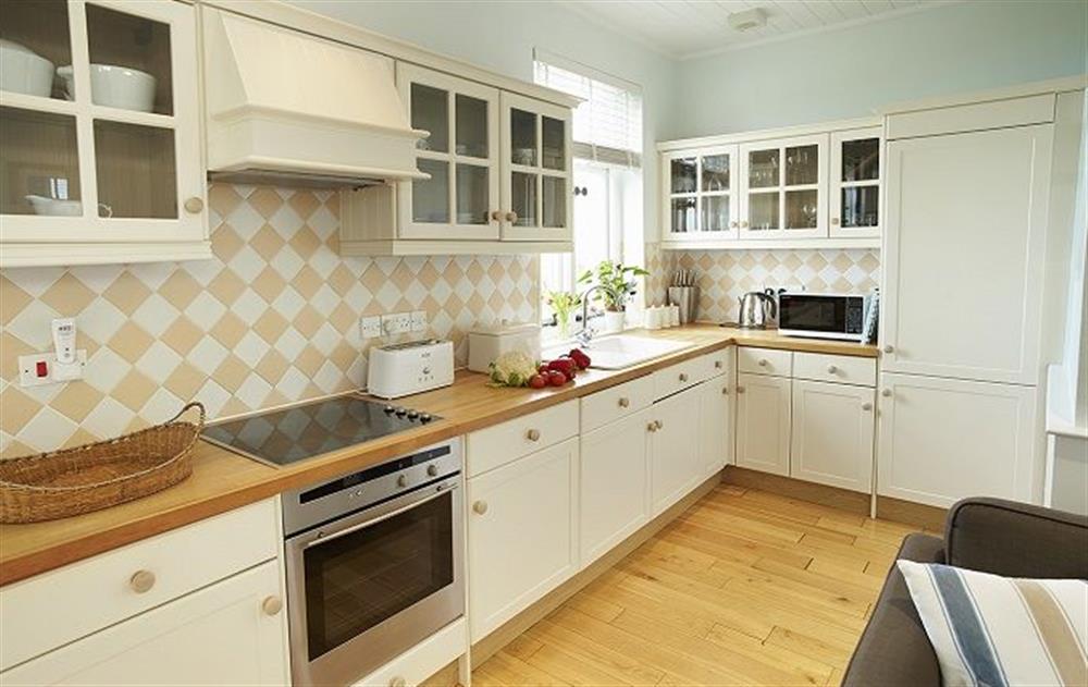 Ground floor: Open plan kitchen, dining and sitting room at The Link, Cromer Lighthouse