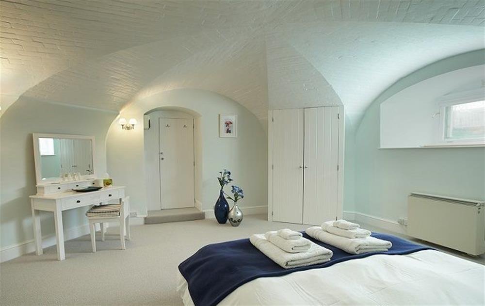 Lower ground floor: Double bedroom with 5' bed (photo 2) at The Link, Cromer Lighthouse