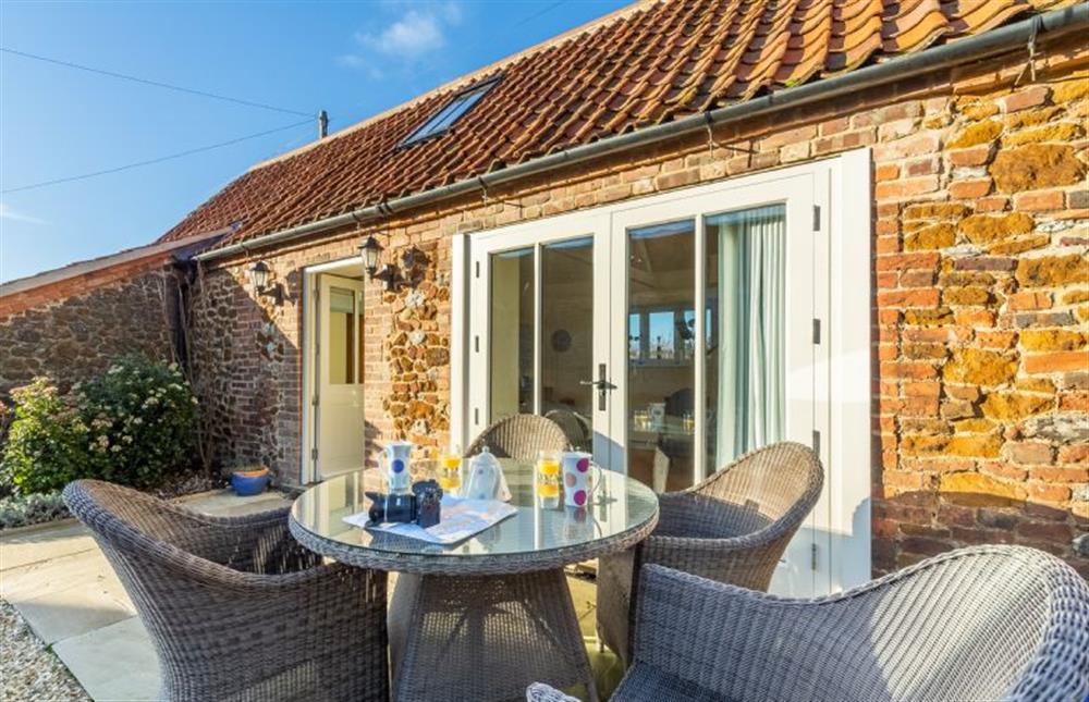 Front elevation with outside dining at The Little Barn, Ringstead near Hunstanton