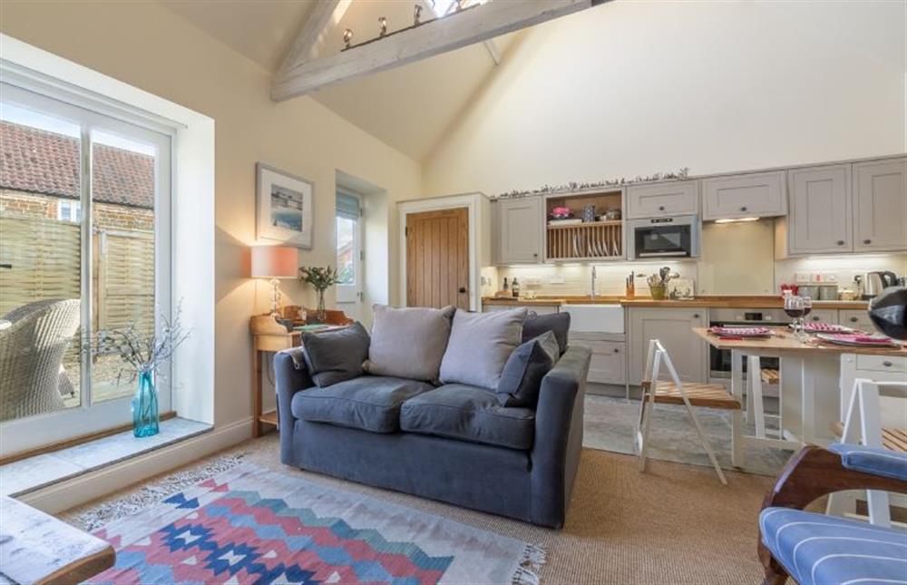 Ground floor: Open-plan living space with doors to courtyard garden at The Little Barn, Ringstead near Hunstanton