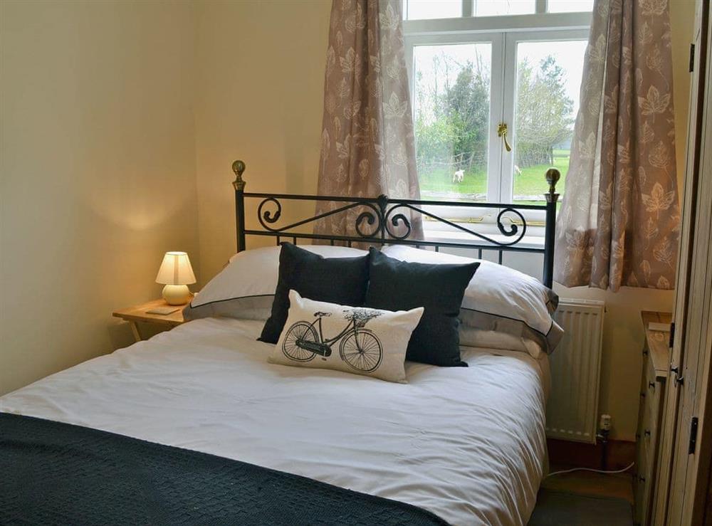 Charming double bedroom at The Little Barn in Woodchurch, near Ashford, Kent