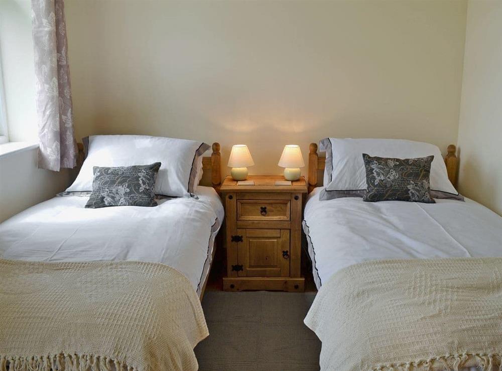 Comfortable twin bedroom at The Little Barn in Woodchurch, near Ashford, Kent