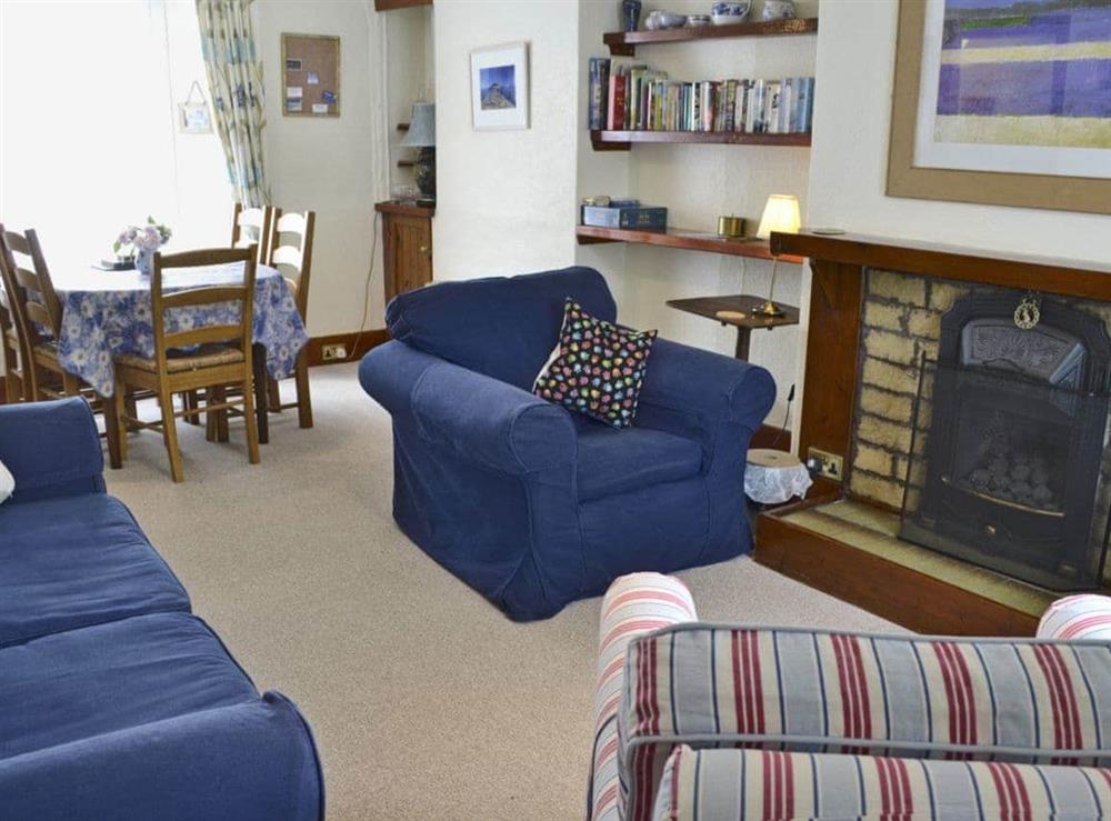 Homely living/dining room (photo 2) at The Little Blue House in Penzance, Cornwall