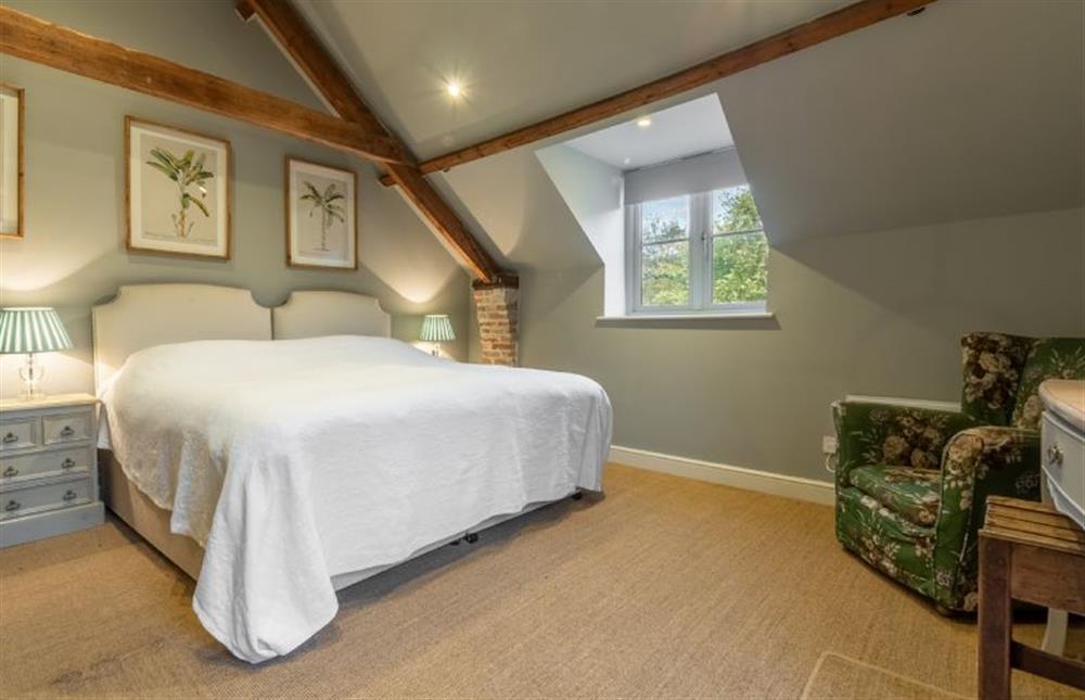 Annexe first floor: Bedroom with super-king size zip-and-link bed at The Little House, Brancaster near Kings Lynn