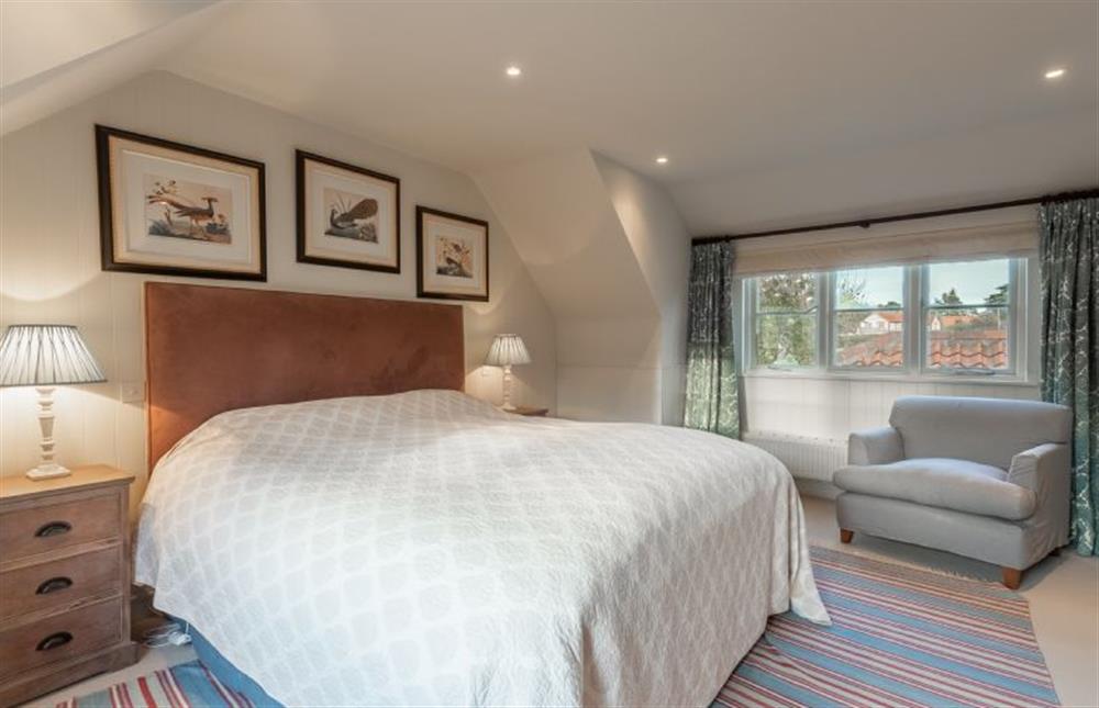 First floor: Bedroom two with views to rear at The Little House, Brancaster near Kings Lynn