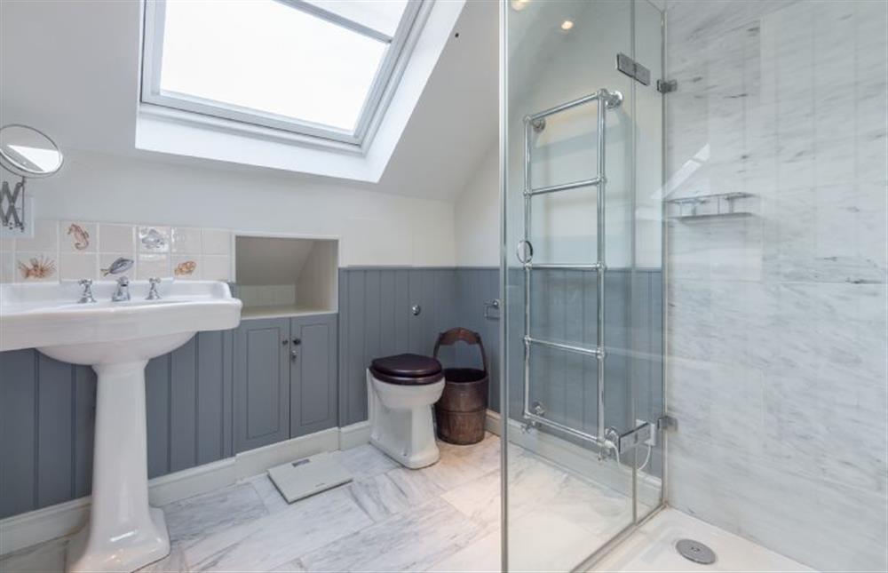 First floor: Family bathroom with bath and separate shower at The Little House, Brancaster near Kings Lynn