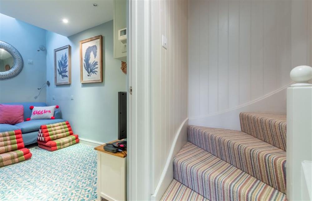 Ground floor: stairs leading to first floor at The Little House, Brancaster near Kings Lynn