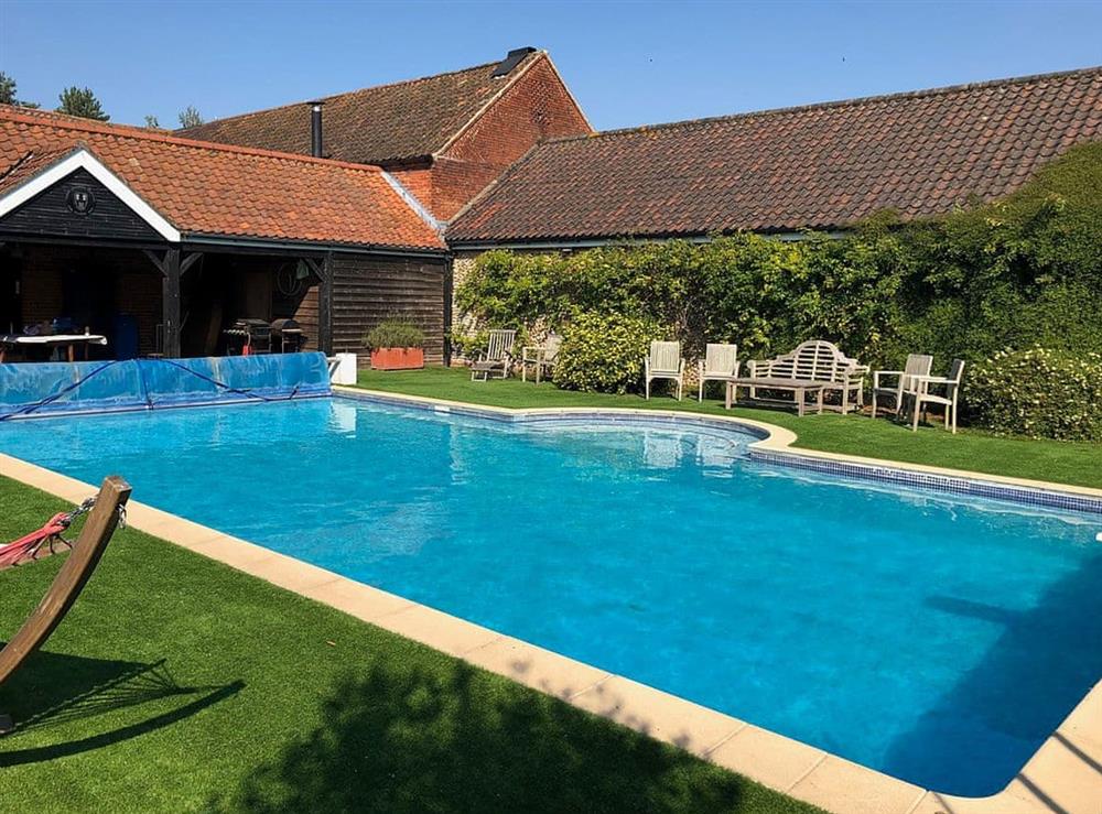Shared heated outdoor pool (photo 2) at The Little House in Hempstead, near Holt, Norfolk