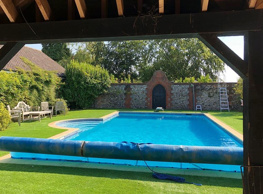 Shared heated outdoor pool (photo 3) at The Little House in Hempstead, near Holt, Norfolk