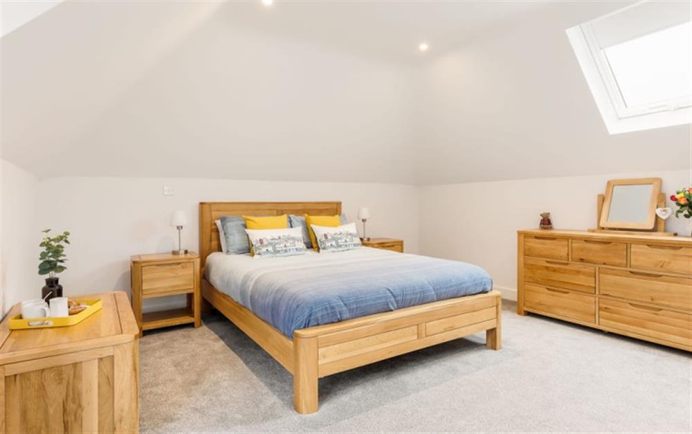 One of the bedrooms at The Little House in Milford On Sea