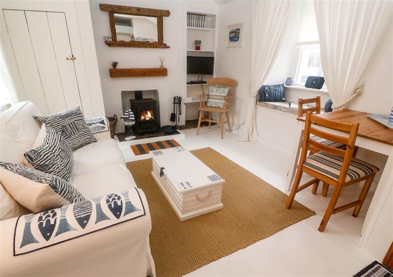 Relax in the living area at The Little Net Loft, Mousehole near Penzance