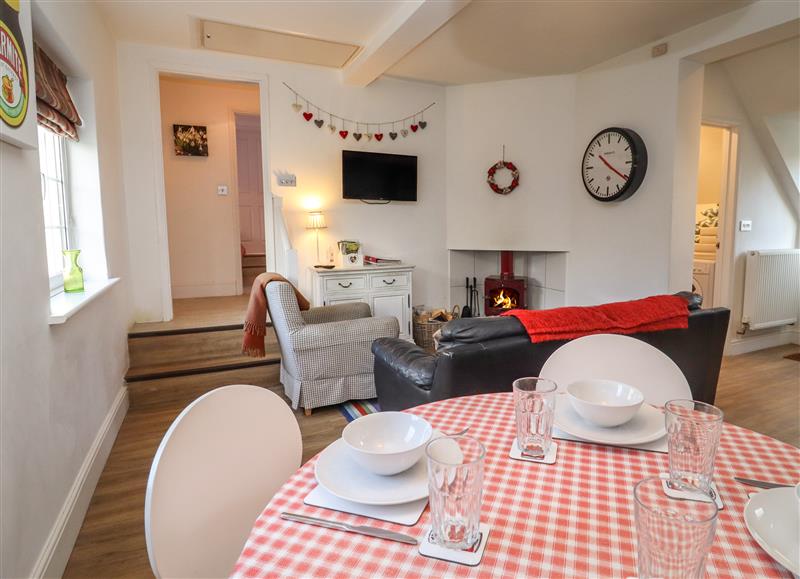 Enjoy the living room at The Little White Cottage, Milton-Under-Wychwood