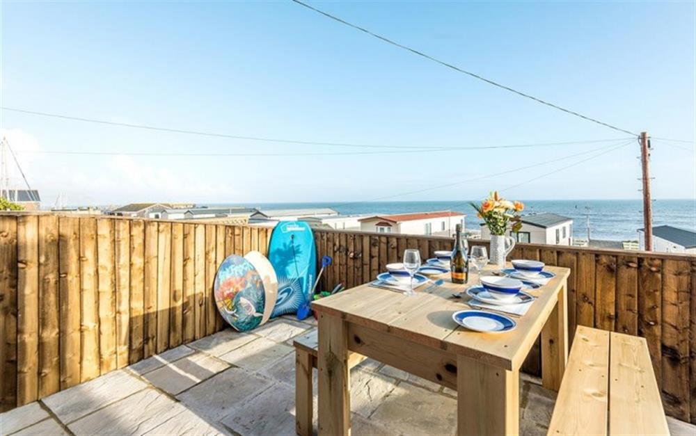 Eat outside and enjoy the stunning views  at The Lobster Pot in Lyme Regis
